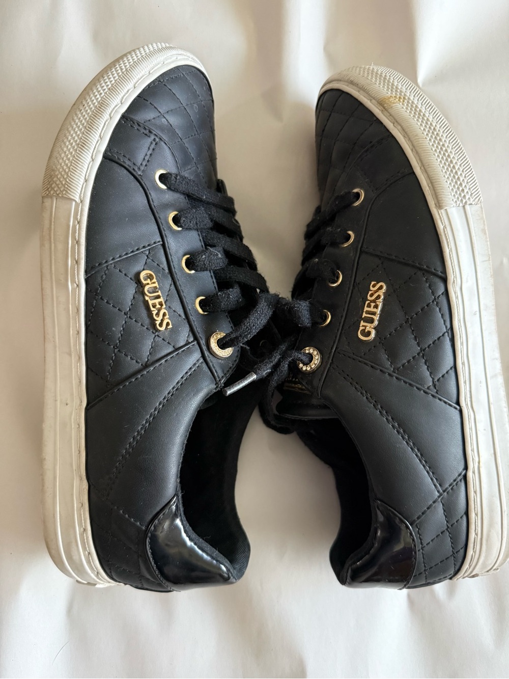 Guess Black Quilted Sneakers with Gold Hardware and White Soles